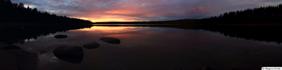 Sunset over calm lake